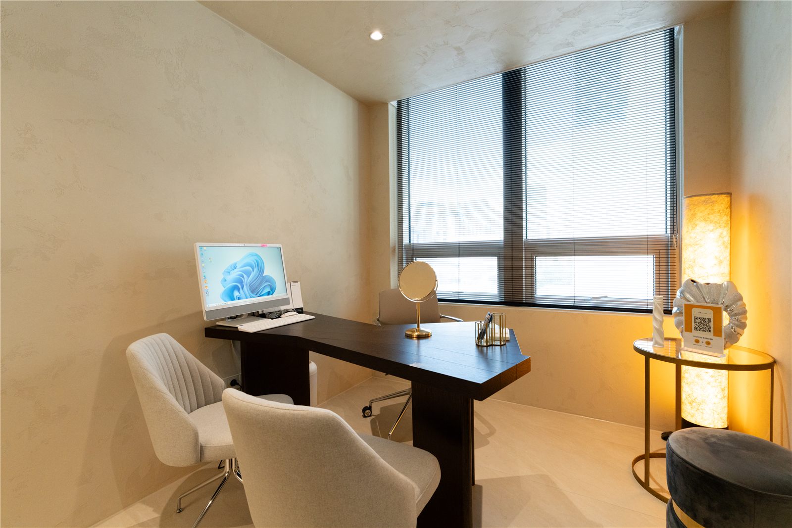 Private consultation room with a window desk